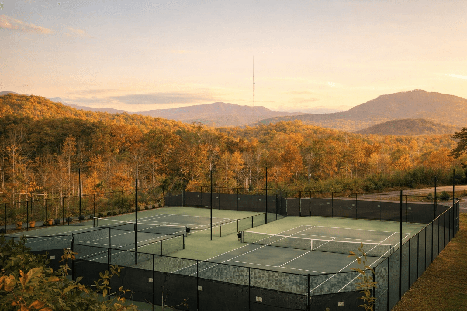 Tennis courts with Blue Ridge mountain backdrop, Vista at Bill’s Mountain