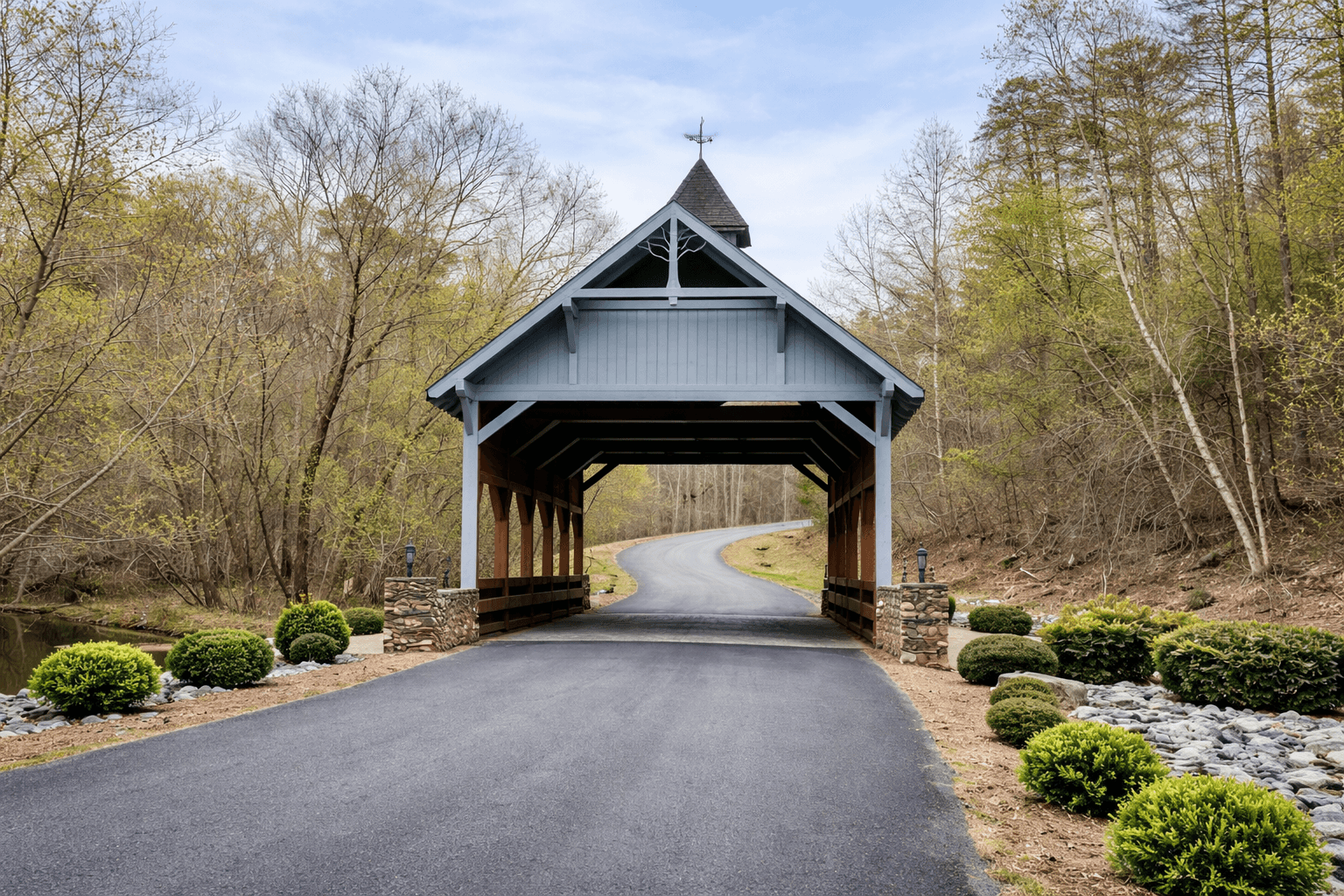 Covered bridge entrance to Lake Adger community, Mill Spring NC